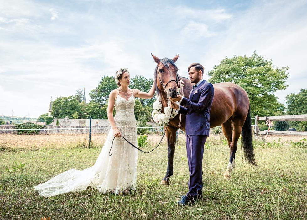 Hochzeitsfoto Brautpaar Pferd